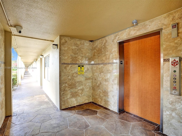 bathroom featuring elevator