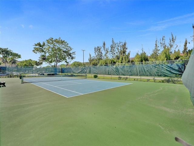 view of tennis court with basketball court