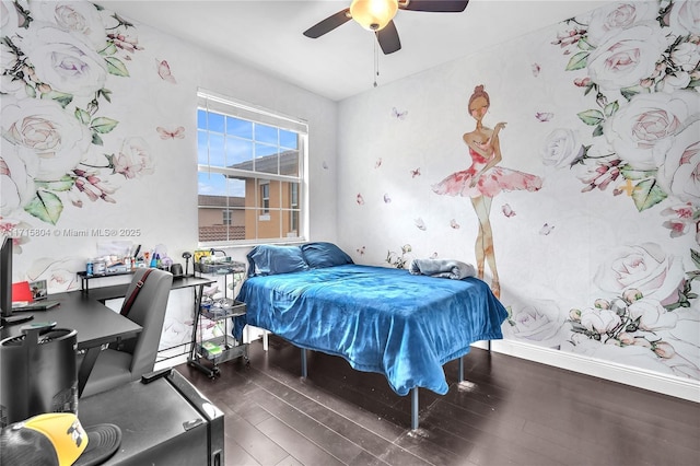 bedroom with ceiling fan and dark wood-type flooring