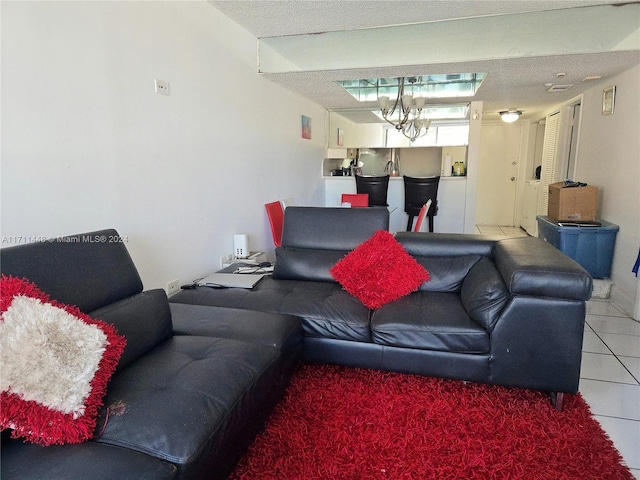 tiled living room featuring a textured ceiling