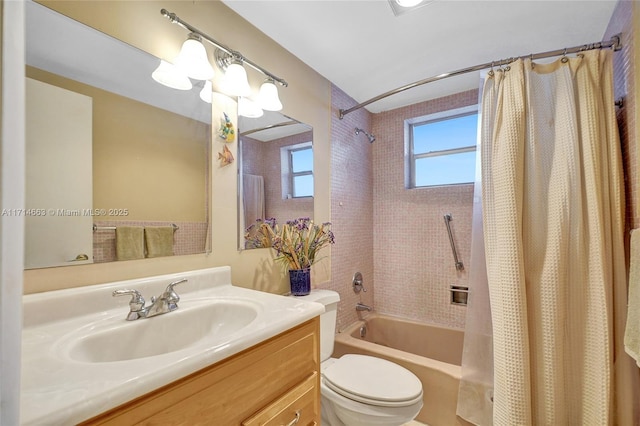 full bathroom featuring vanity, toilet, and shower / bath combo with shower curtain