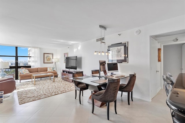 dining room with expansive windows