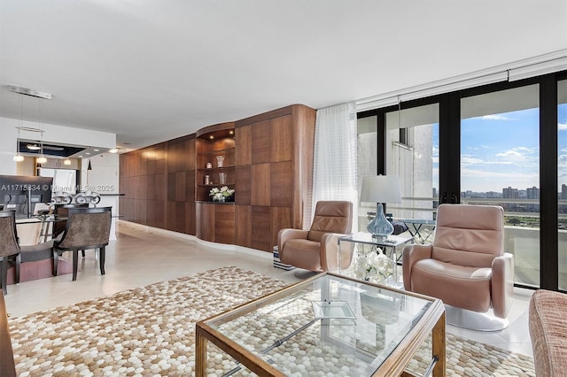 tiled living room with expansive windows