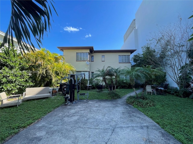 view of front of home with a front yard