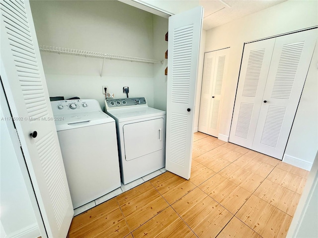 washroom with separate washer and dryer