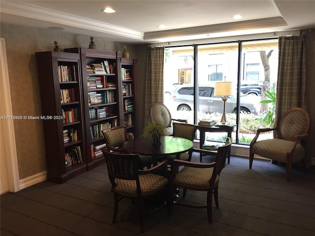 sitting room featuring a tray ceiling and dark hardwood / wood-style floors