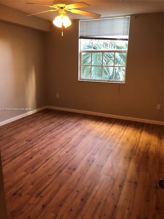 empty room featuring hardwood / wood-style floors