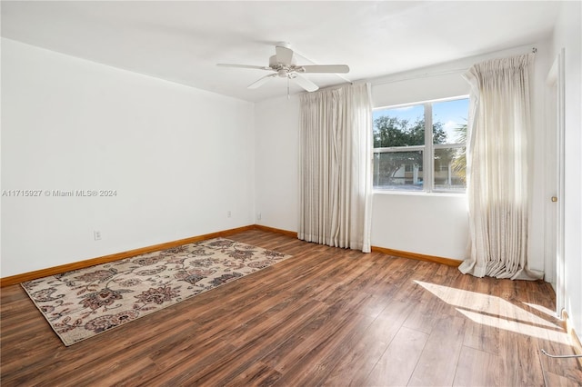 unfurnished room featuring hardwood / wood-style floors and ceiling fan