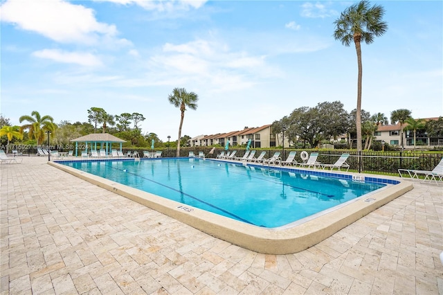 view of swimming pool featuring a patio area