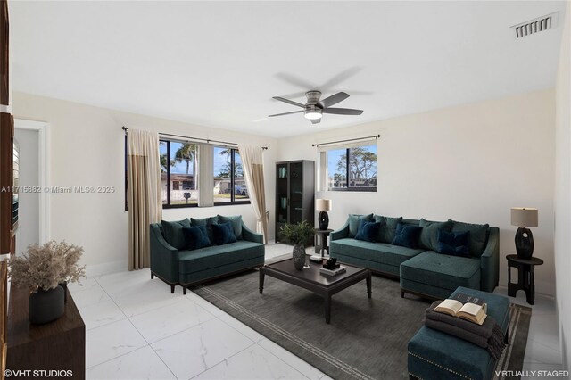 living room featuring ceiling fan