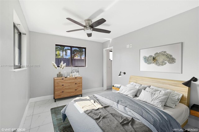 empty room featuring ceiling fan and a healthy amount of sunlight