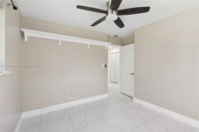 empty room with ceiling fan