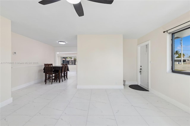 empty room featuring ceiling fan