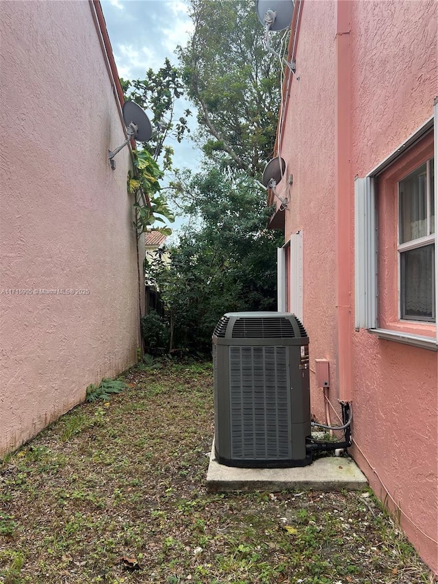 view of yard featuring central AC