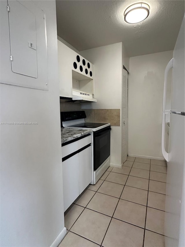 kitchen with a textured ceiling, white appliances, extractor fan, white cabinets, and electric panel