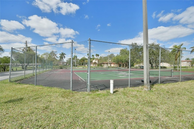 view of basketball court featuring a lawn and tennis court