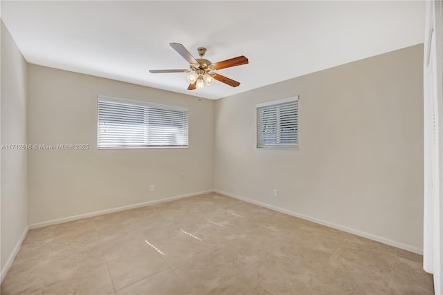 spare room featuring ceiling fan