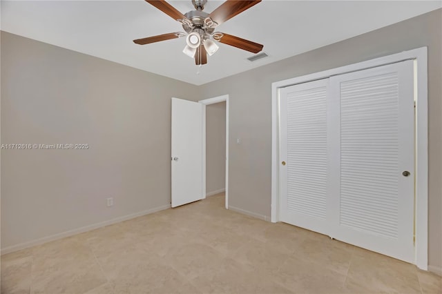 unfurnished bedroom featuring a closet and ceiling fan