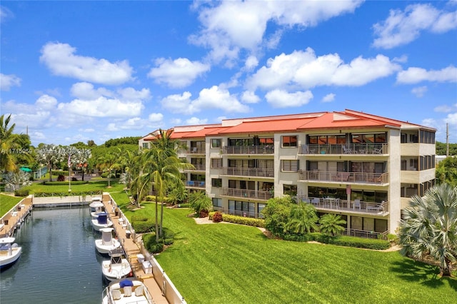 view of building exterior featuring a water view