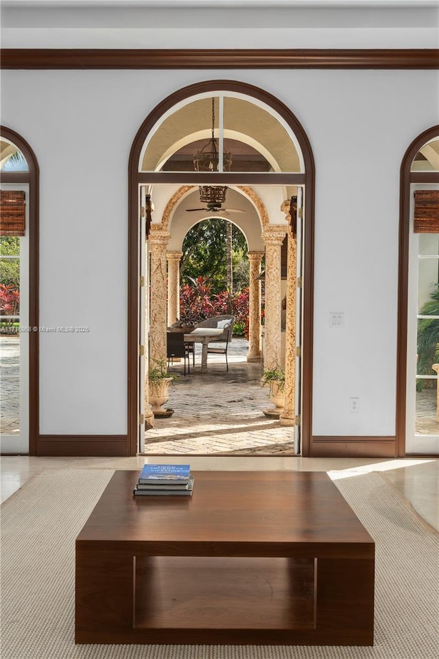 interior space featuring baseboards