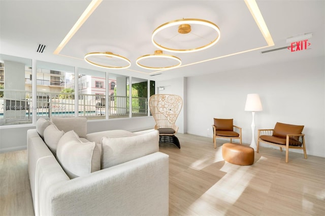 living room with light hardwood / wood-style floors