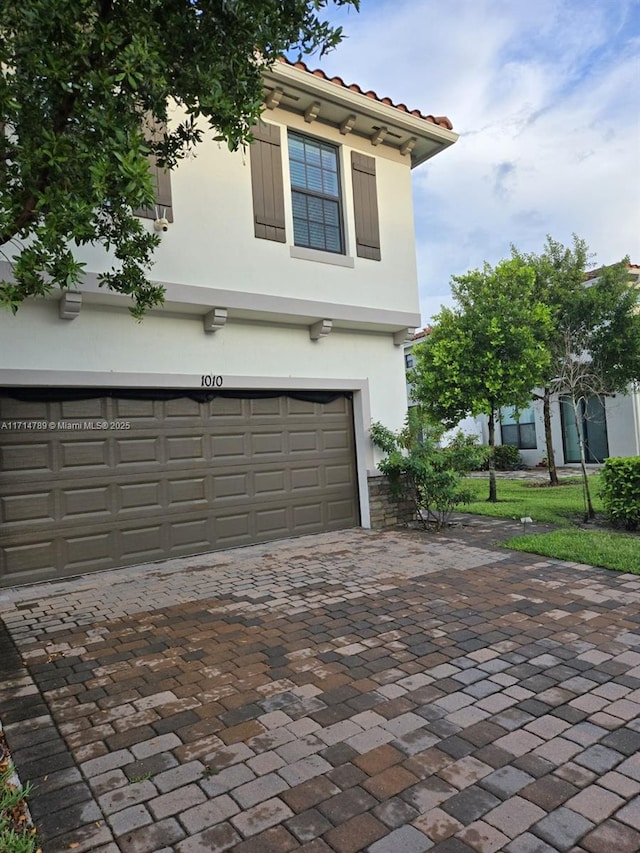 exterior space featuring a garage