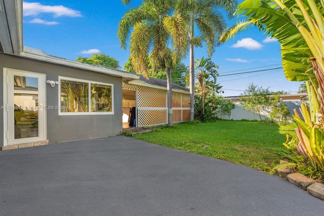 exterior space featuring a lawn