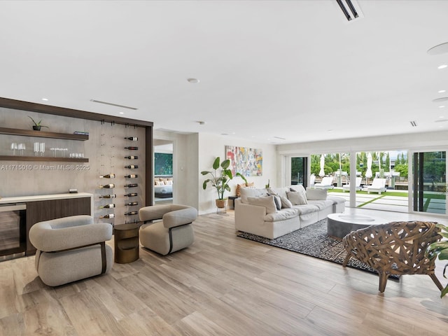 living room with light hardwood / wood-style floors