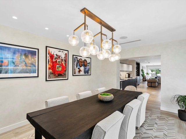 dining space featuring light hardwood / wood-style floors