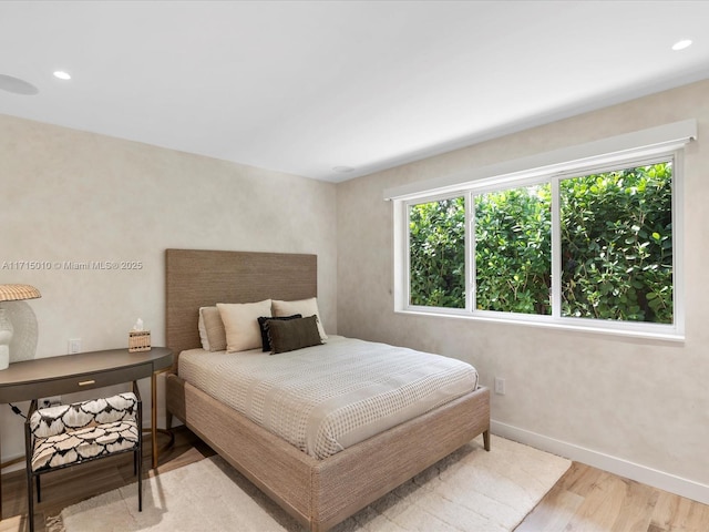 bedroom featuring light wood-type flooring