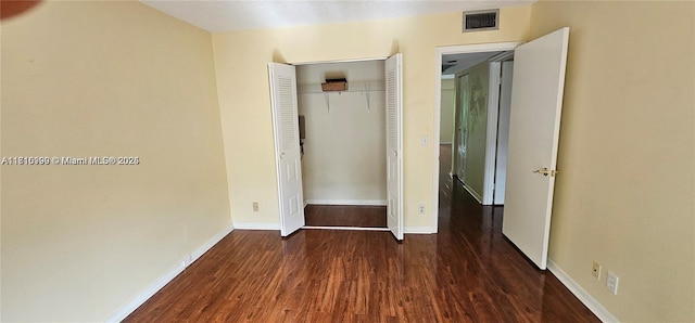 251 SW 132nd Unit 417H, Pembroke Pines, FL 33027 - unfurnished bedroom with wood finished floors and a closet