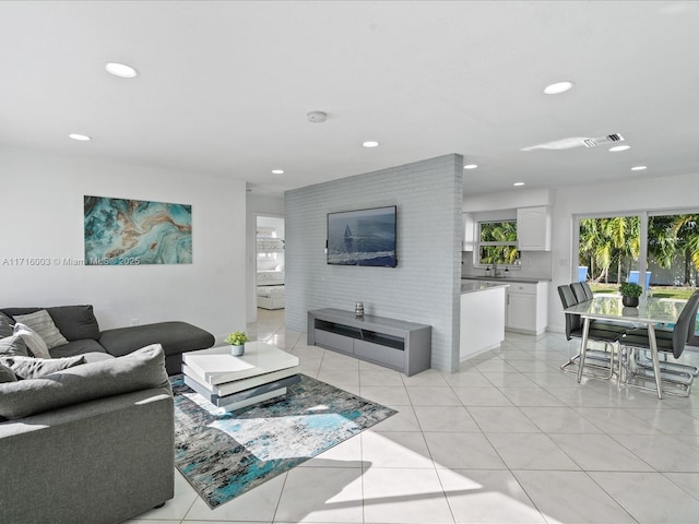 living room featuring light tile patterned floors