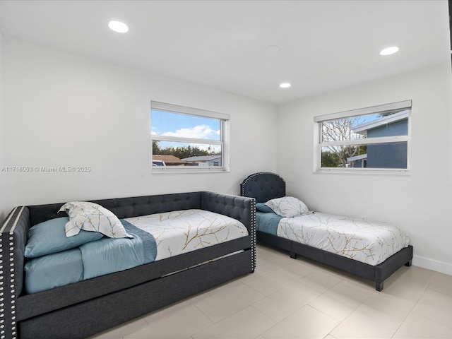 bedroom featuring multiple windows