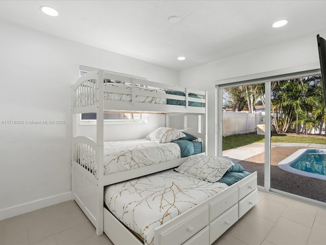 bedroom featuring access to exterior and light tile patterned floors