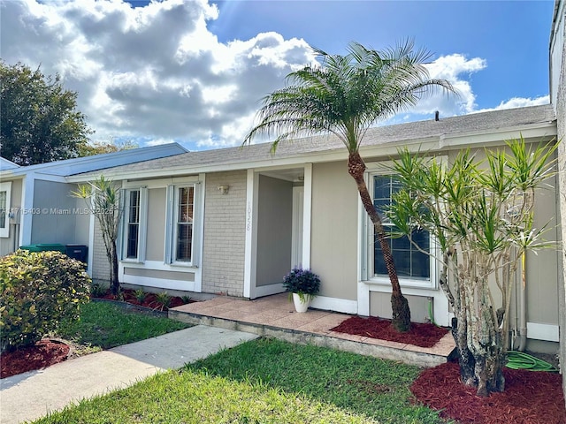 exterior space with a front lawn