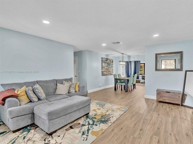 6708 NW 58th Ct, Tamarac, FL 33321 - living room with light wood-type flooring