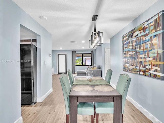 dining room featuring light hardwood / wood-style floors