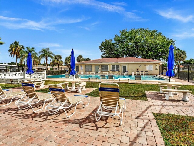 6708 NW 58th Ct, Tamarac, FL 33321 - exterior space with a patio and a community pool