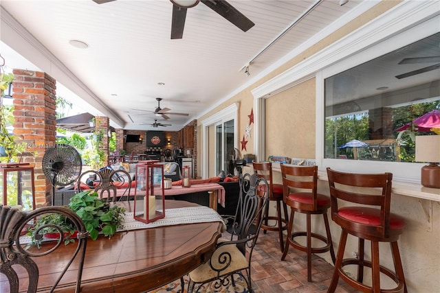 view of patio featuring ceiling fan