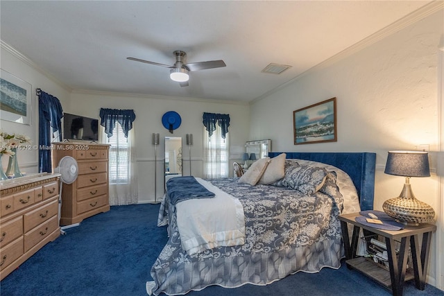 carpeted bedroom featuring ceiling fan and ornamental molding