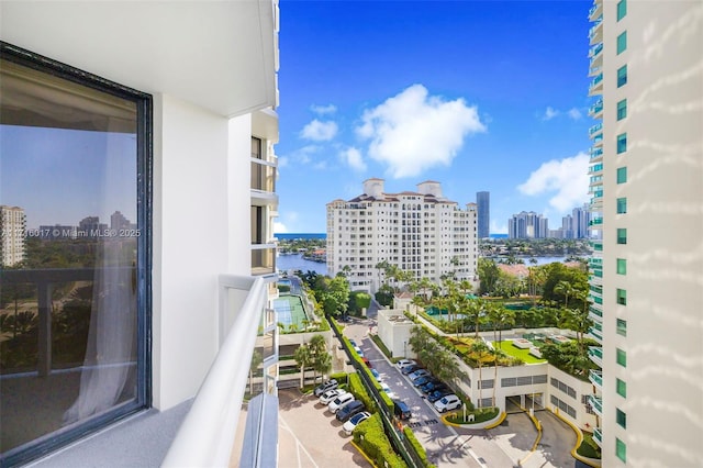 balcony featuring a water view