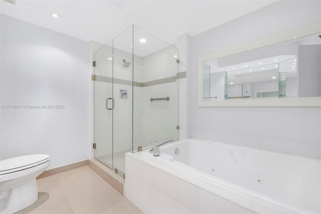 bathroom featuring tile patterned flooring, separate shower and tub, and toilet