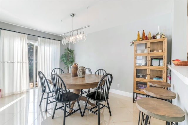 dining space with light tile patterned floors