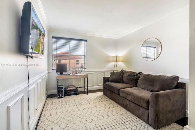 living room featuring crown molding