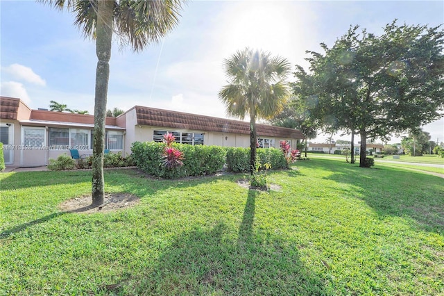 view of front of house with a front yard