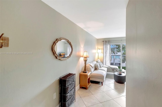 sitting room featuring light tile patterned floors