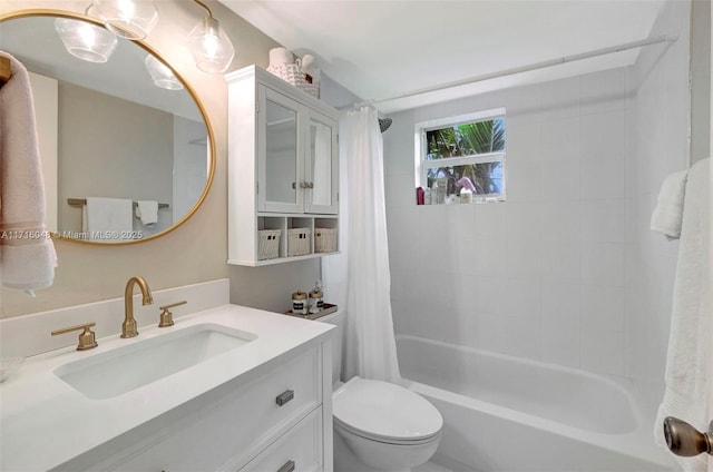 full bathroom featuring toilet, shower / bath combo, and vanity