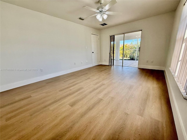 unfurnished room featuring ceiling fan and light hardwood / wood-style flooring