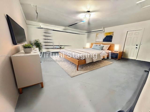 bedroom with concrete flooring