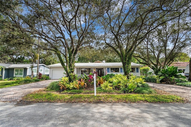 view of front of home with a garage